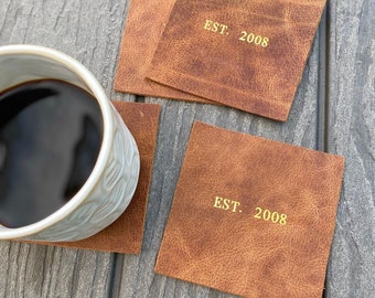 4" Square leather coasters. Set of 4. Free gold or sliver foil personalization. Choose from CrazyHorse, Chocolate, Caramel, or Black leather