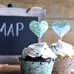 Vintage Map Cupcake Wrappers for Adventure Themed Events! Perfect for weddings, baby showers, and birthdays. Made using real vintage atlases
