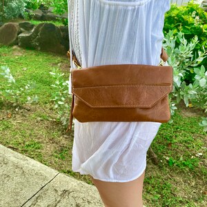 The Path Less Traveled crossbody or hip purse. Choose from two colors. Adjustable strap. Perfect for travel.