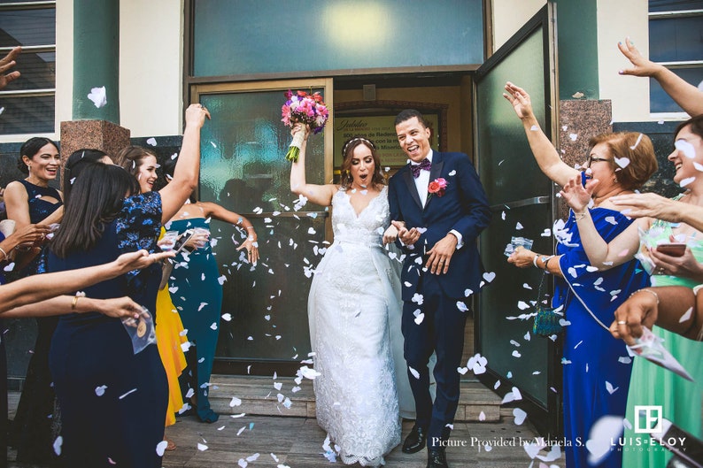 White Heart Shaped Biodegradable Tossing Wedding Confetti. FSC® certified 100% recycled US paper product.