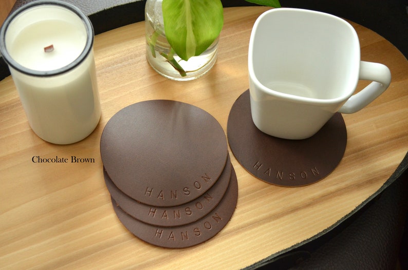 4 Leather Circle Coasters. 4.5 Wide. Choose from Caramel Brown, Chocolate, Black, Western, Camel & other colors Personalization Available. Chocolate Brown