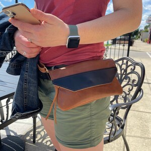 The Path Less Traveled cross body purse. Adjustable strap. Two leather colors.