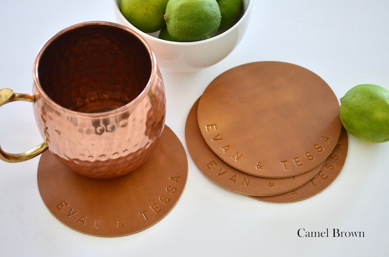 4 Leather Circle Coasters. 4.5 Wide. Choose from Caramel Brown, Chocolate, Black, Western, Camel & other colors Personalization Available. Camel Brown