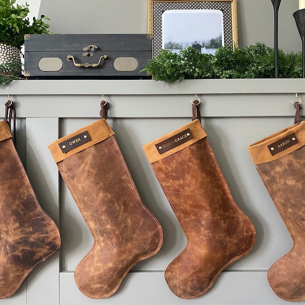 Full Grain Leather Christmas Stocking. Crazy Horse brown leather with brass finish hardware. Free gold foil personalization and US shipping.