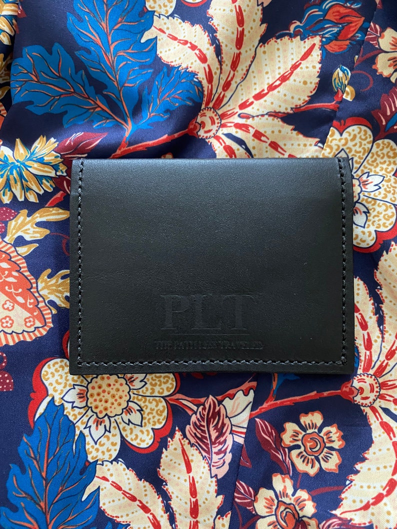 The Path Less Traveled Bi-Fold leather wallet. Choose from black, brown, or black with hair on Leppard print.