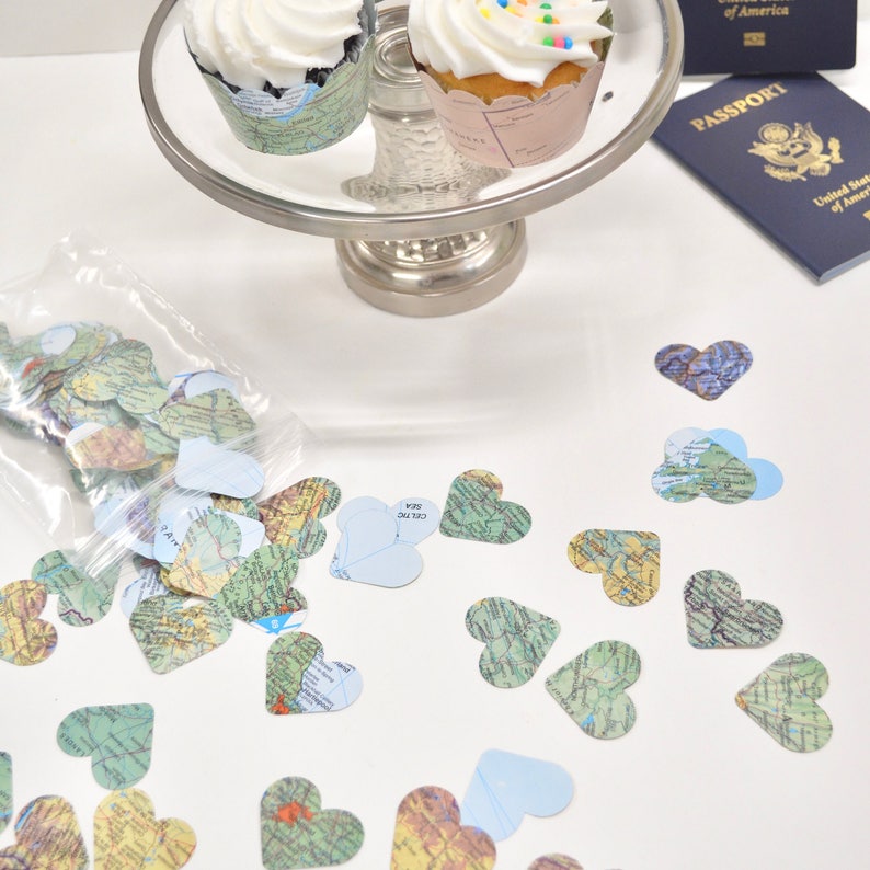 Vintage Map Heart Confetti. Created using world atlases, each heart is 1.5" wide and has images on both sides. Perfect table confetti.