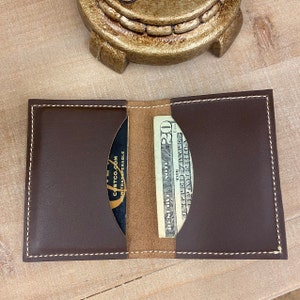 The Path Less Traveled Bi-Fold leather wallet. Choose from black, brown, or black with hair on Leppard print.