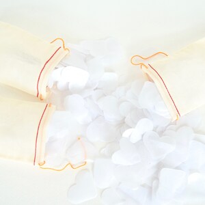 White Heart Shaped Biodegradable Tossing Wedding Confetti. FSC® certified 100% recycled US paper product.