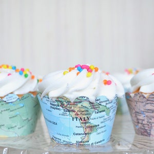 Vintage map cupcake wrappers. Created from actual world atlases. Fits most regular sized cupcakes.