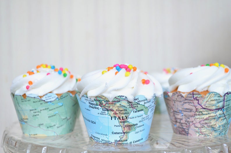 Vintage map cupcake wrappers. Created from actual world atlases. Fits most regular sized cupcakes.