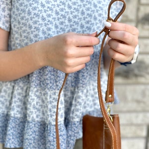 The Path Less Traveled cross body purse. Adjustable strap. Two leather colors.