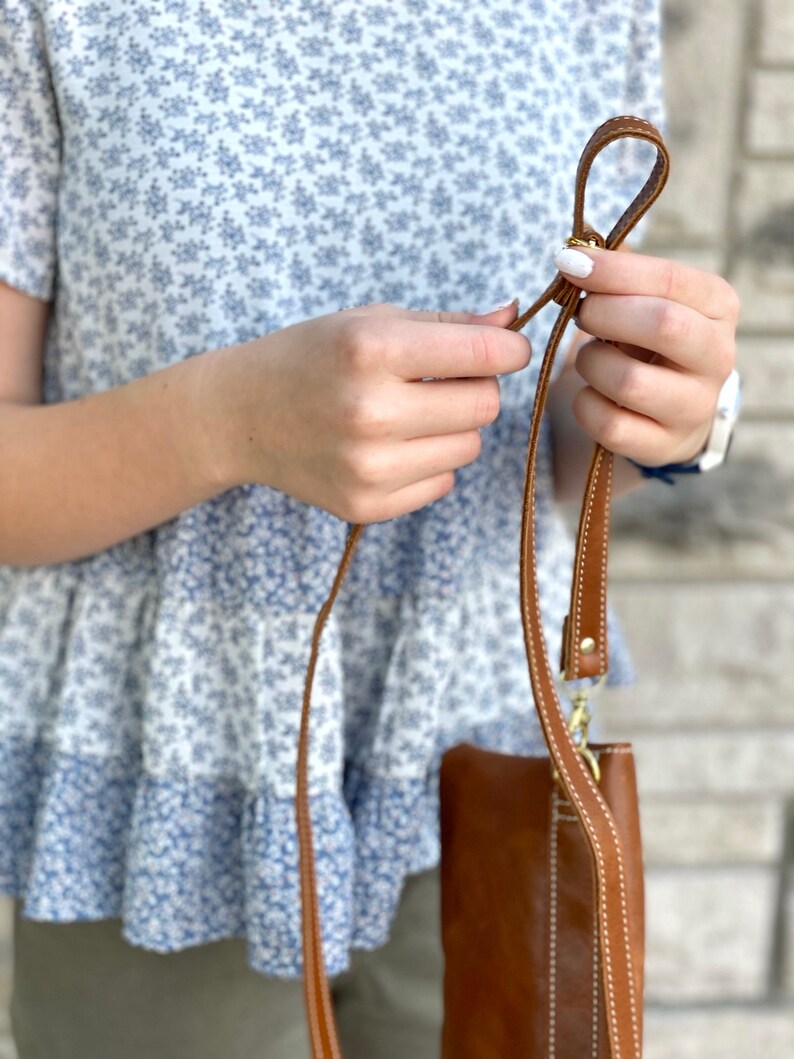 The Path Less Traveled cross body purse. Adjustable strap. Two leather colors.