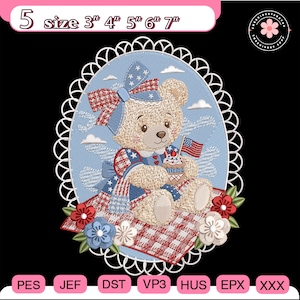 May include: An embroidery design featuring a tan teddy bear wearing a blue and red patterned outfit with a matching bow, holding a small American flag cupcake. The oval frame includes a white lace border, red and blue flowers, and text: 5 size 3" 4" 5" 6" 7".
