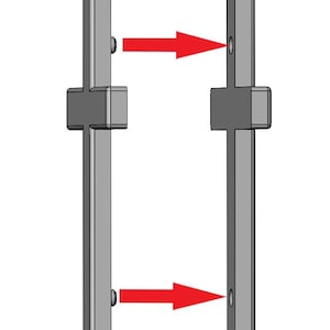 May include: Two gray metal brackets with a cross-shaped design. The brackets are positioned side-by-side with red arrows pointing to the screw holes on each bracket.