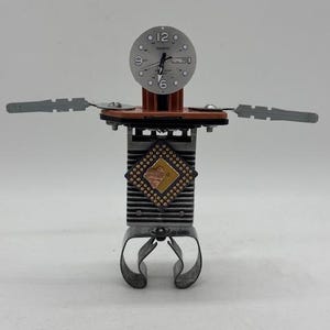 Timekeeper Automaton, unique sculpture, handmade sculpture, recycled robot