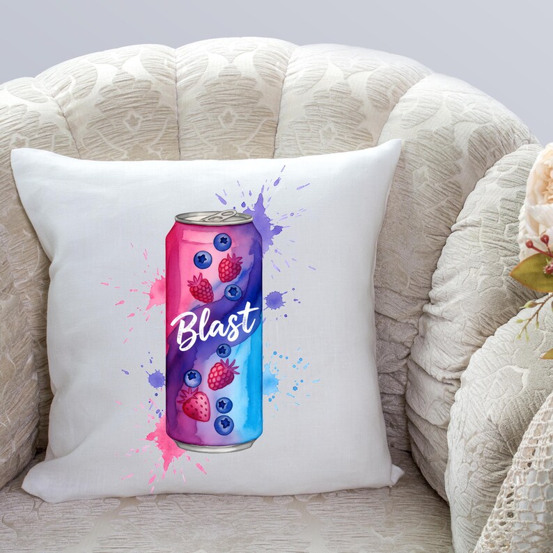 May include: White cushion with a watercolour design of a soda can, the word "Blast" is written on the can. The can is pink, blue, and purple with illustrations of blueberries and strawberries. Colourful paint splatters surround the can.