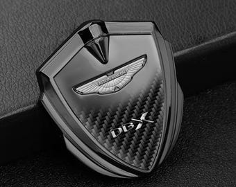 Metal Car Emblem with Silicone Logo Aston Martin – Stylish Auto Decoration, Weather-Resistant Badge, Size 60/65mm