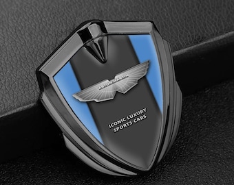 Metal Car Emblem with Silicone Logo Aston Martin – Stylish Auto Decoration, Size 60/65mm
