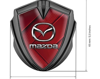 Metal Car Emblem with Silicone Logo Mazda – Stylish Auto Decoration, Weather-Resistant Badge, Size 60/65mm