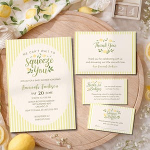 May include: Baby shower invitation set with a lemon theme. The invitation reads "We can't wait to Squeeze You" and includes details for the event. Additional cards include "Thank You", "Books for Baby", and "Diaper Raffle". The set is decorated with lemon illustrations.