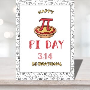May include: A white card with a black and white geometric pattern border. The card says "Happy Pi Day 3.14 Be Irrational" with a red and yellow pie illustration.