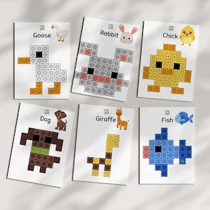 May include: Six educational cards featuring pixel art animal designs: a goose, rabbit, chick, dog, giraffe, and fish. Each card displays the animal's name and a corresponding illustration made of colorful blocks. The cards are on a white background.