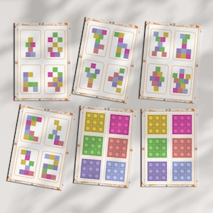 Peut inclure: Six cartes d'activités rectangulaires présentant des motifs et des grilles basés sur des blocs colorés. Les cartes affichent diverses formes géométriques construites à partir de petits carrés roses, verts, jaunes, bleus et violets.