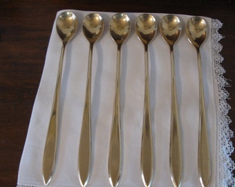 Six Dirilyte Regal Iced Tea Spoons  8 1/4"Long  VG preowned condition  No defects  Malted Milk spoons  Lemonade spoons  Lovely