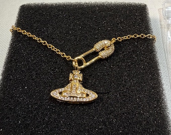 Vivienne Westwood Gold Orb Paperclip Necklace: Planet Inspired Fashion Jewelry