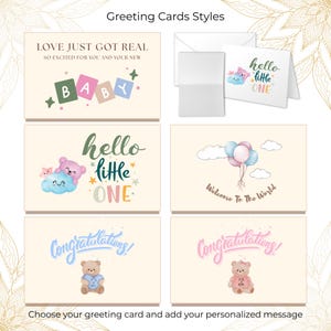 May include: A collection of baby-themed greeting cards with various designs. The cards feature phrases like "Love Just Got Real" and "Hello Little One." Some cards include illustrations of teddy bears, clouds, and balloons. The text "Congratulations!" is also present.