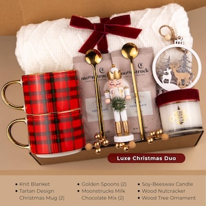 Luxury Christmas gift box with tartan mugs, blanket, nutcracker, candle, and ornament — elegant holiday gift basket for her, cozy winter decor and cocoa set.
