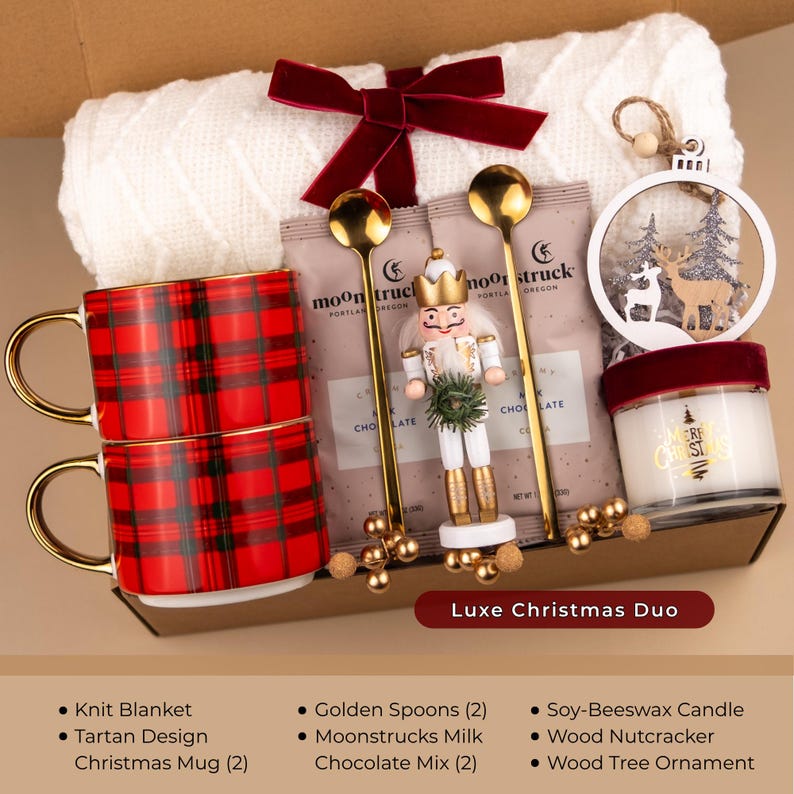 Luxury Christmas gift box with tartan mugs, blanket, nutcracker, candle, and ornament — elegant holiday gift basket for her, cozy winter decor and cocoa set.