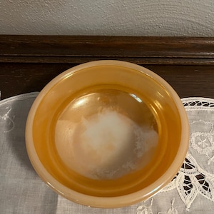 Vintage Fire King Peach Lustre Bowl, worn in base of bowl