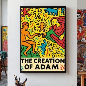 以下が含まれることがあります： ミケランジェロの「アダムの創造」を鮮やかにポップアートで表現した額装アートプリント。鮮やかな色の人物が黄色い背景に描かれ、下部には「THE CREATION OF ADAM」のタイトルが記されています。