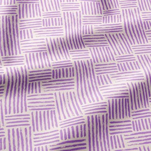 May include: A fabric featuring a repeating geometric pattern of purple brushstroke lines on a light cream background. The design consists of alternating blocks of vertical and horizontal stripes, creating a textured, woven-like appearance across the surface.
