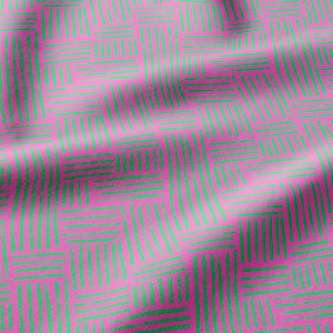 May include: A textile fabric featuring a repeating geometric pattern of short, hand-drawn style green lines arranged in alternating horizontal and vertical blocks against a solid, vibrant pink background, creating a textured visual effect.