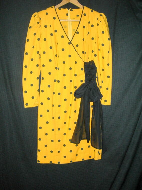 yellow and black polka dot dress