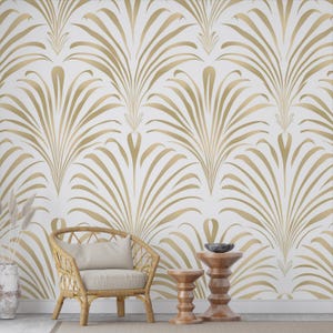 Elegant gold art deco wallpaper with palm-inspired fan pattern on white background, perfect for modern glam interiors and statement walls