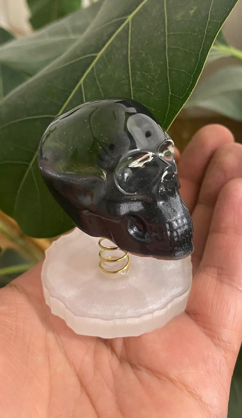 Cute and creepy epoxy skull for dashboard or workspace