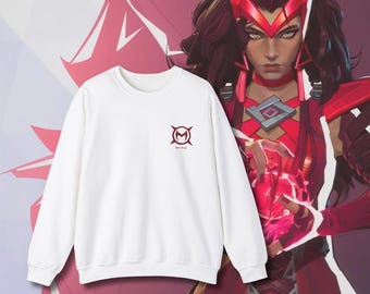 May include: White sweatshirt with a red logo featuring a stylized "M" inside a circle with four points. The logo is centered on the chest of the sweatshirt.