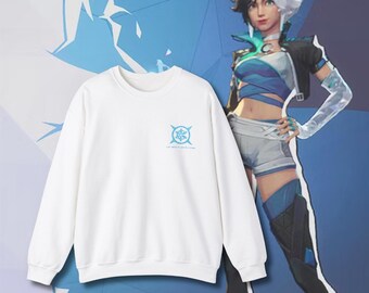 May include: White sweatshirt with a blue snowflake design and the text "The world isn't just a game".
