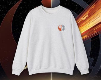 May include: A gray sweatshirt with a white Rebel Alliance symbol on the front. The symbol is a combination of the Rebel Alliance logo and the Imperial logo.