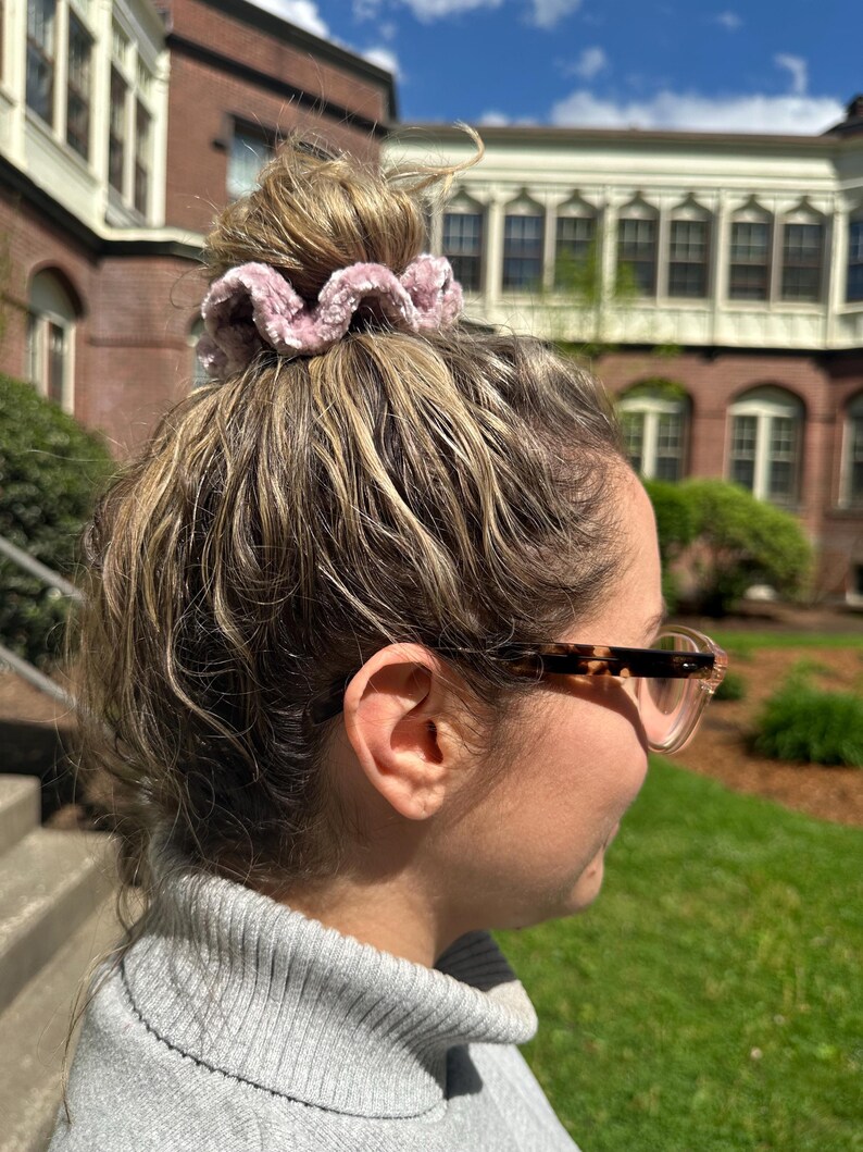 A pink velvet scrunchie