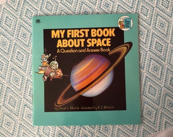 My First Book About Space - A Question and Answer Book - by Dinah L. Moche' Illustrated by R. Z. Whitlock - Clean Great Condition