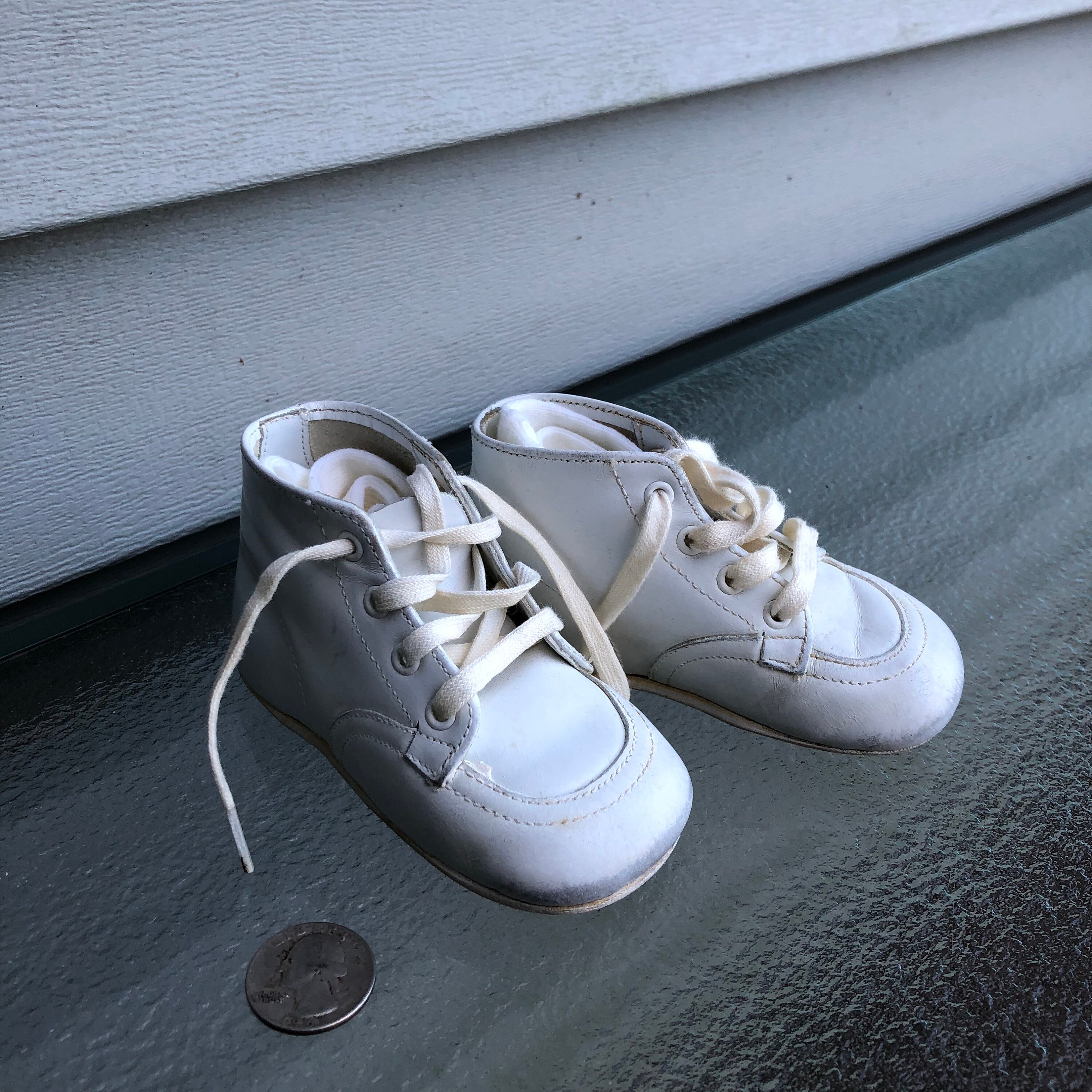 white hard bottom baby shoes