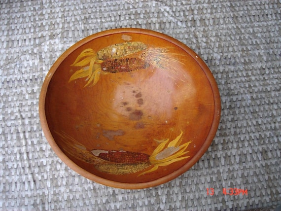 A large hand-carved and hand-painted dough bowl signed by the artist 'Juanita' — 59 favorites confirms real appetite for this one-of-a-kind folk art piece.