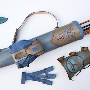 Archery Leather Set Of A Hand Tooled Quiver, A Detachable Pouch, An Arm Guard And A Shooting Glove
