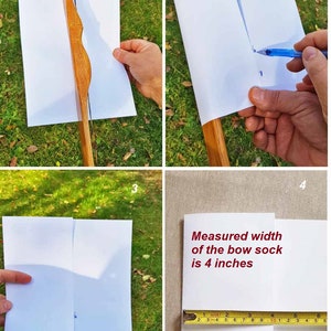 K&ouml;nnte beinhalten: Ein Holzbogen mit einem Papierstreifen darauf. Das Papier ist in der Mitte gefaltet und mit einem Stift markiert. Ein Ma&szlig;band zeigt, dass die Breite des Bogens 4 Zoll betr&auml;gt. "Gemessene Breite des Bogensocken ist 4 Zoll" steht in roter Schrift.