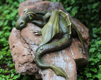 Dragon sculpture on driftwood