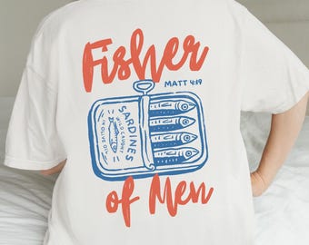 May include: White t-shirt with a graphic design on the back. The design features a blue sardine can with the words "Fisher of Men" in red, and the Bible verse "Matt 4:19".
